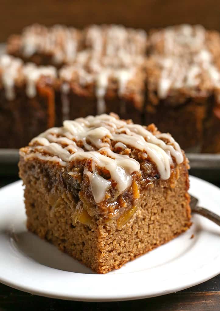 a close view of paleo peach cobbler coffee cake, showing the layers 