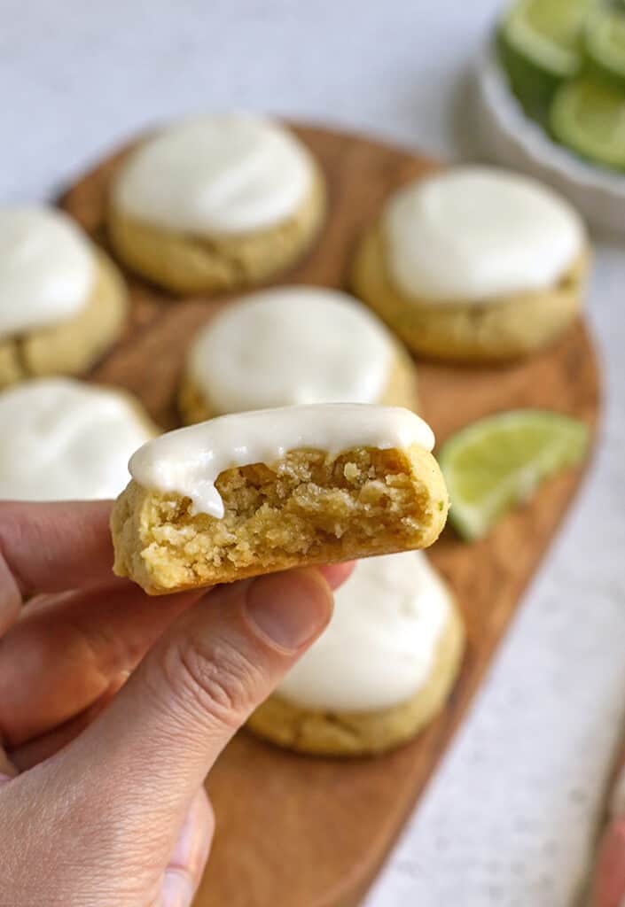 hand holding a soft paleo lime cookie