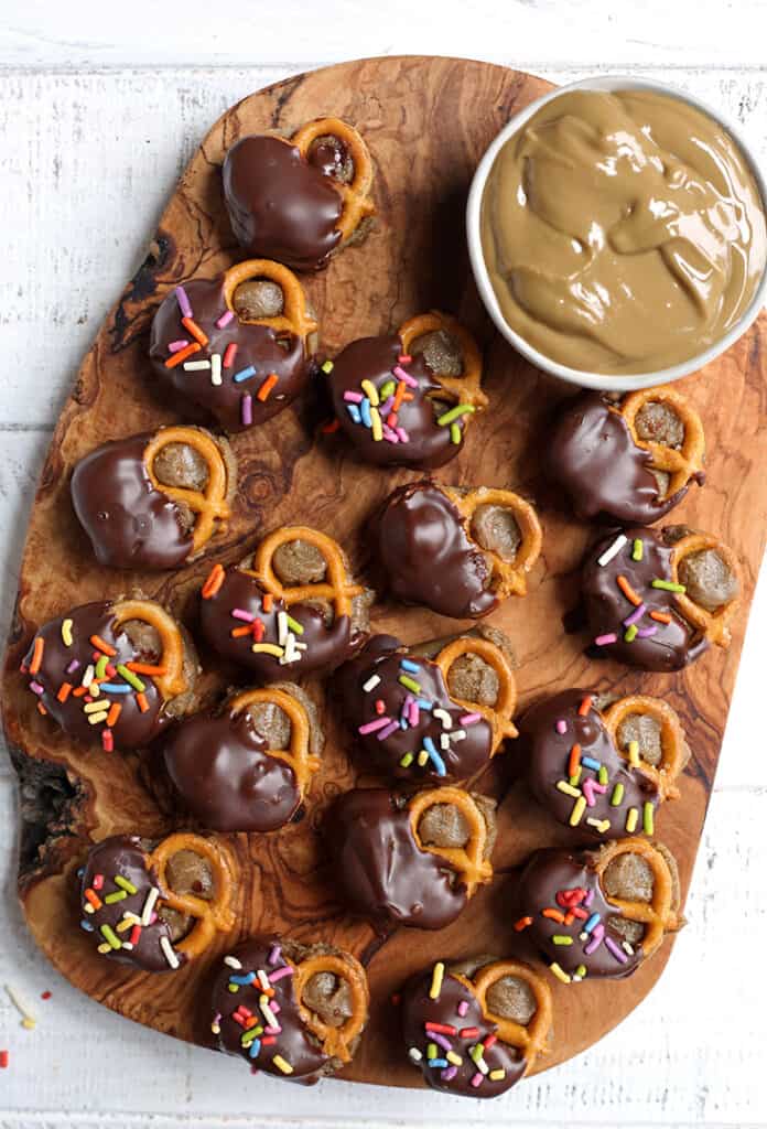 a cutting board filled with gluten free sunbutter pretzel bites