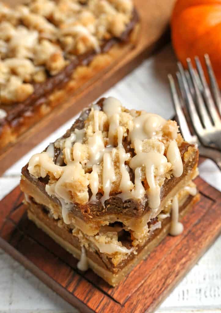 stack of paleo pumpkin bars with a bite out of the top one