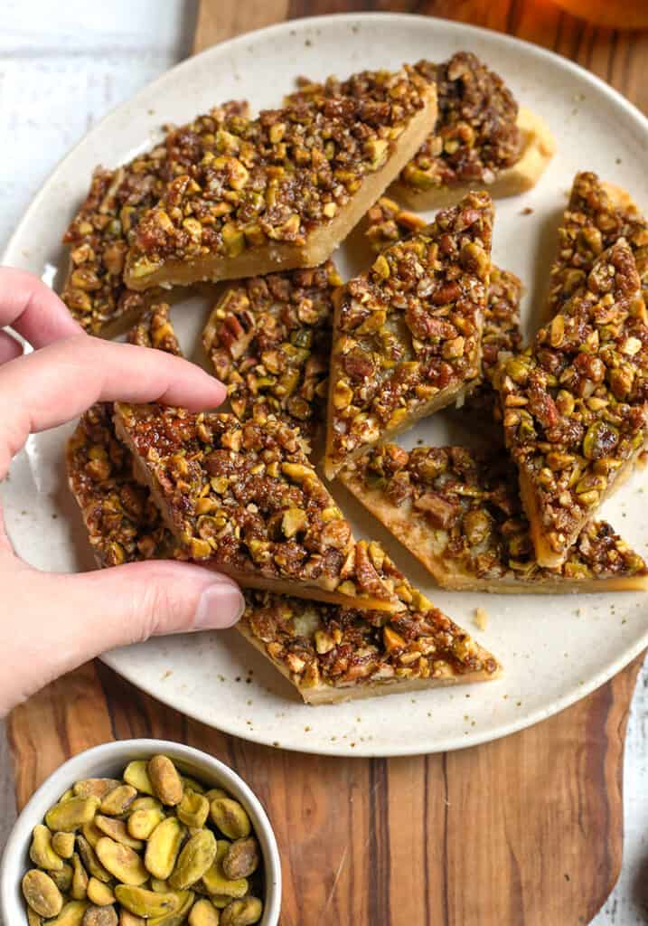 hand reaching for healthy baklava bars 