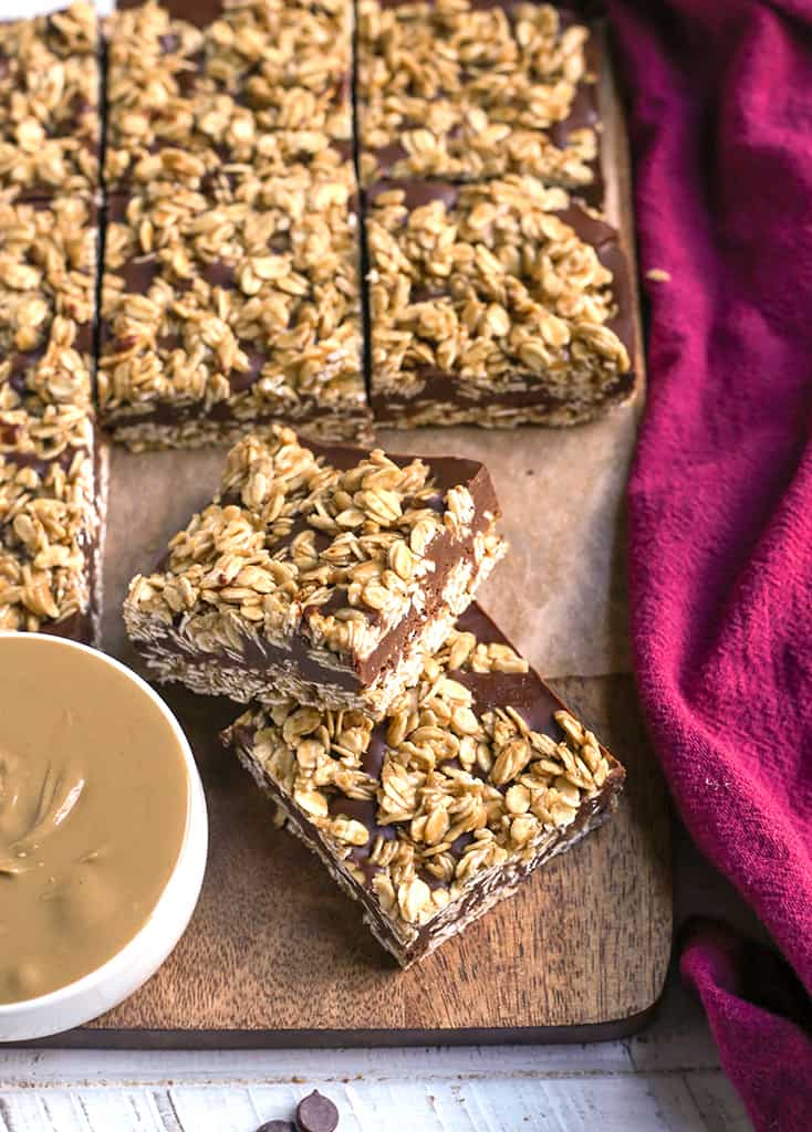 chocolate oat fudge bars, cut on a cutting board