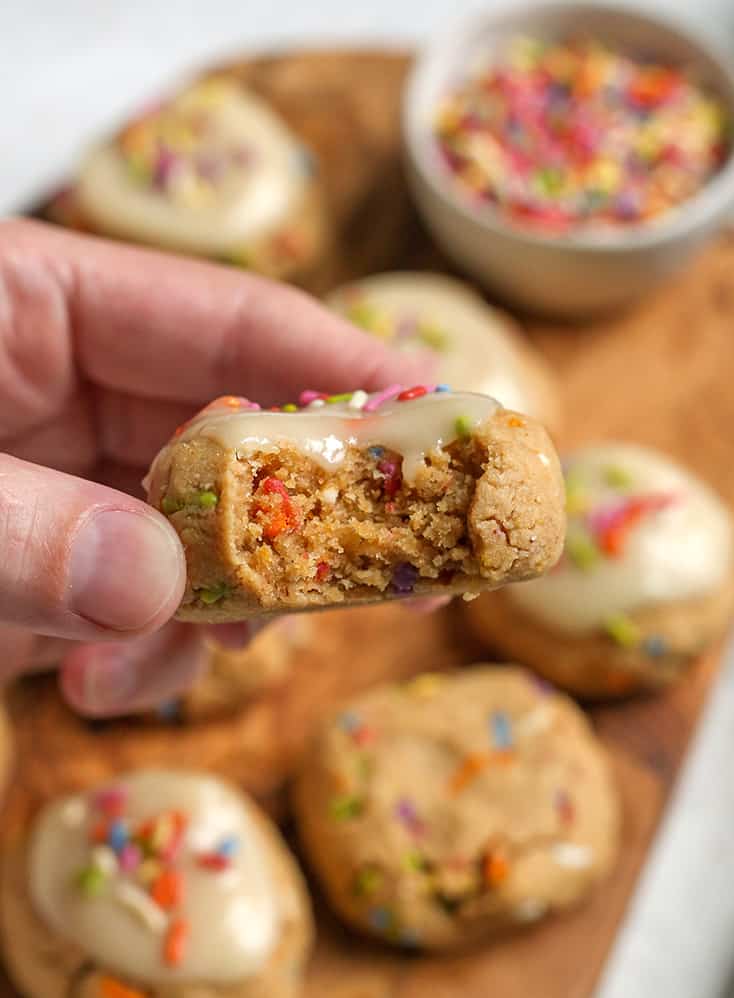 hand holding a paleo cookie with glaze 