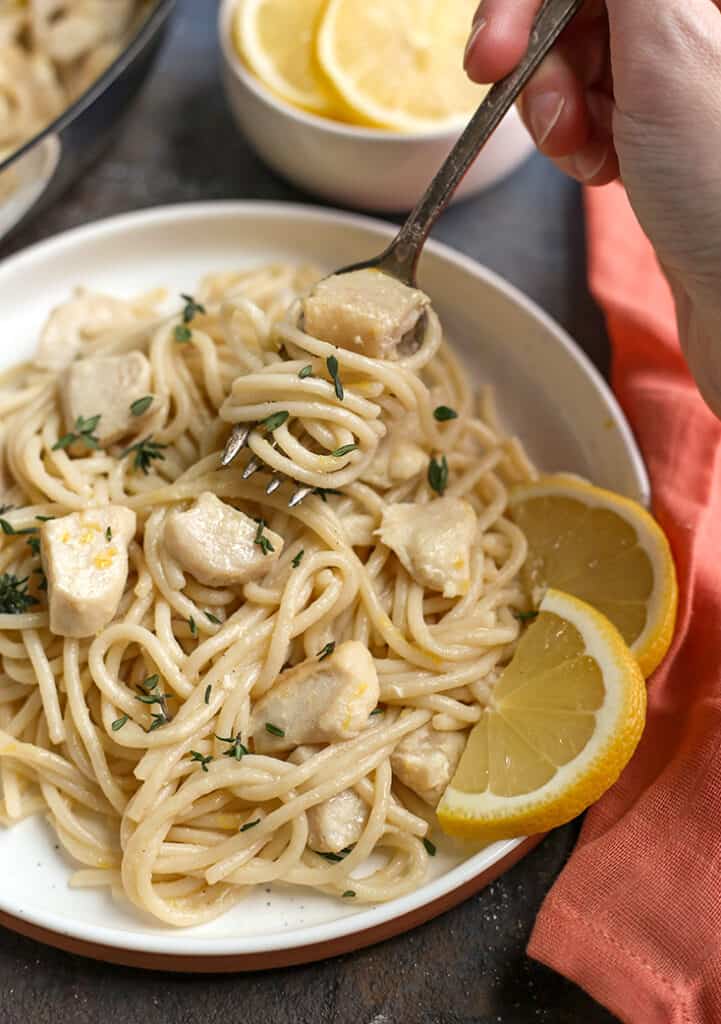 fork twirling a bite of gluten free butter pasta 