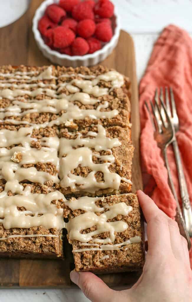 gluten free cheesecake coffee cake on a cutting board 