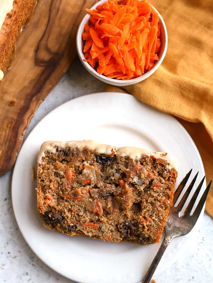 a piece of healthy carrot cake bread on a small plate 