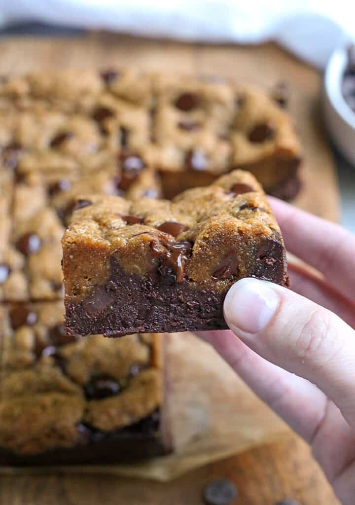 hand holding a fudgy paleo brookie