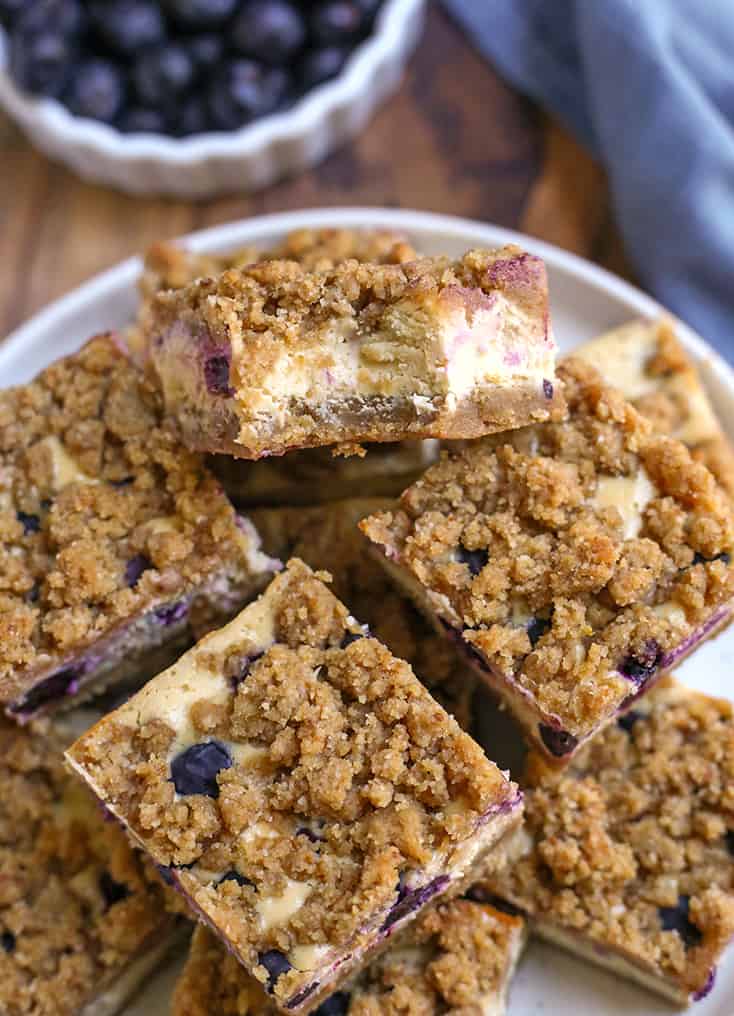 plate of gluten free blueberry cheesecake squares