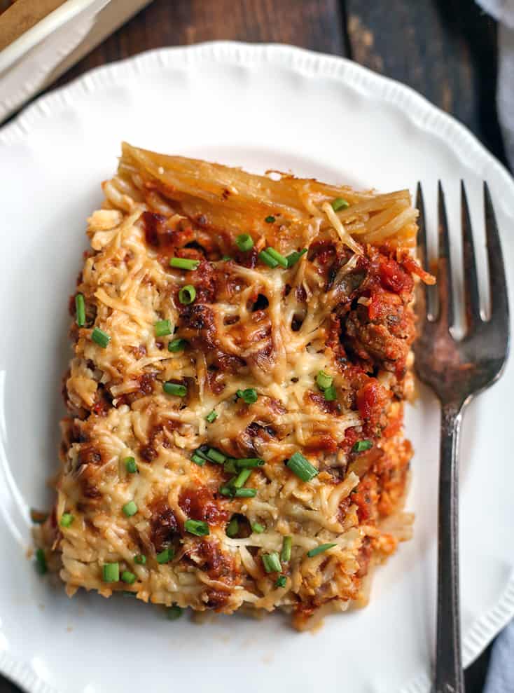 top view of the goat cheese on top of the spaghetti pie 