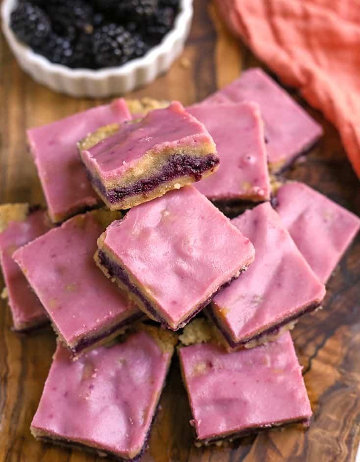 stack of blackberry pop tart bars on a cutting board