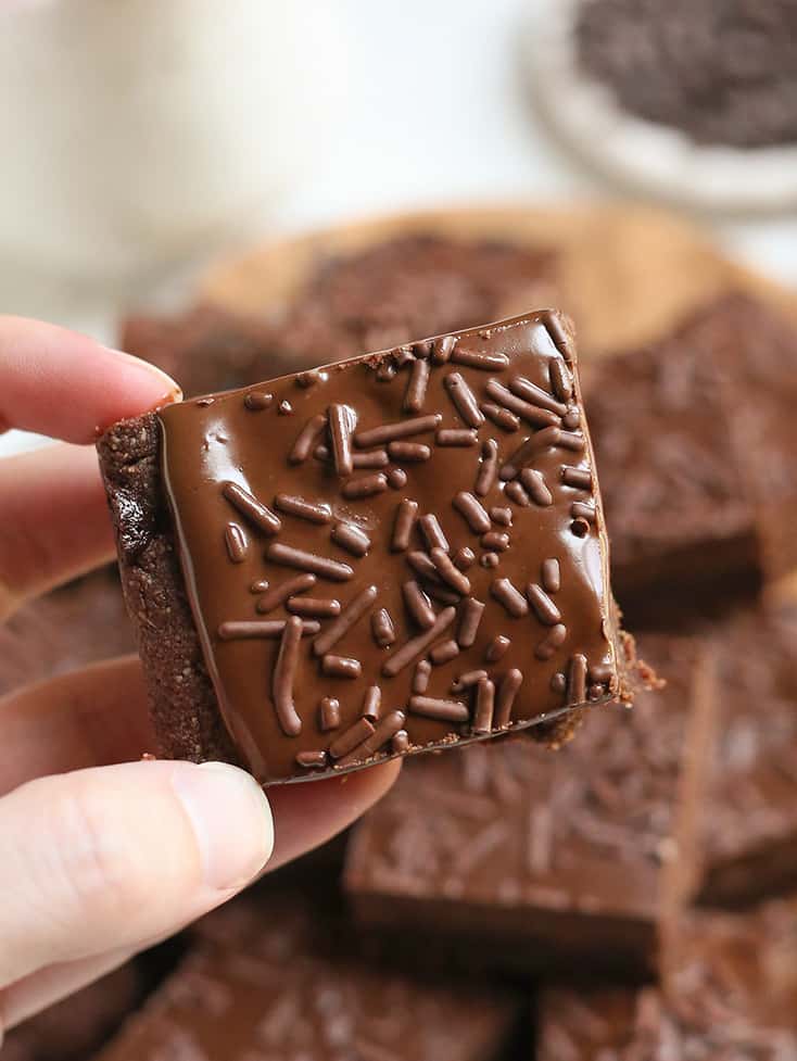 hand holding a chocolate fudge pop tart bar