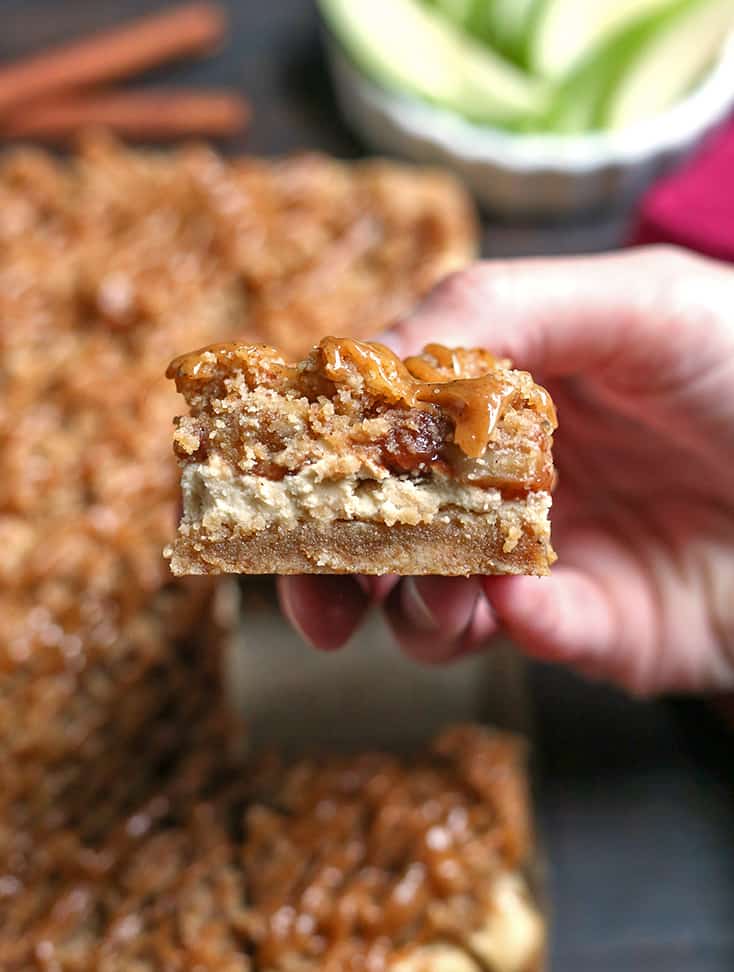 hand holding grain free caramel apple cheesecake 