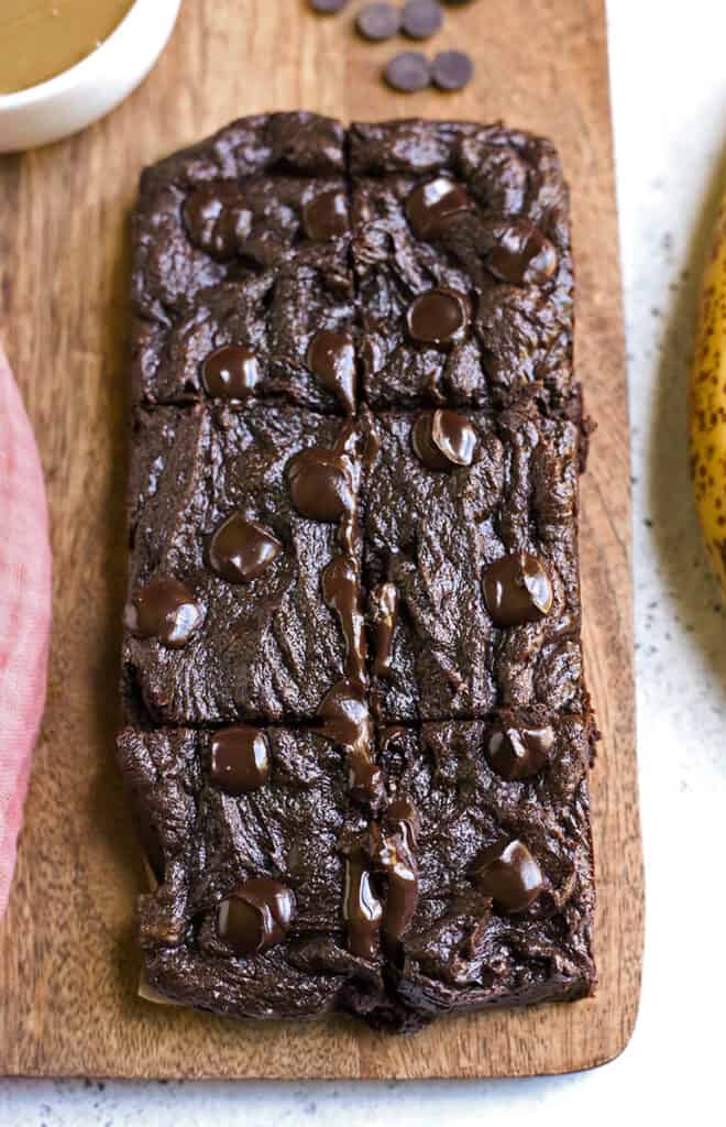 top view of vegan brownies showing the melty chocolate on top 