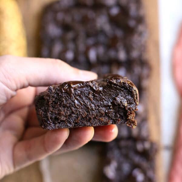 One of the Paleo Vegan Banana Brownies in the left hand