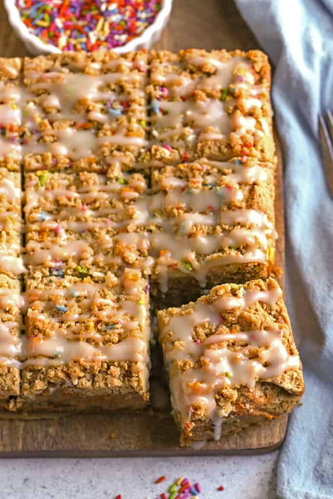 top view of sprinkle coffee cake on a cutting board 