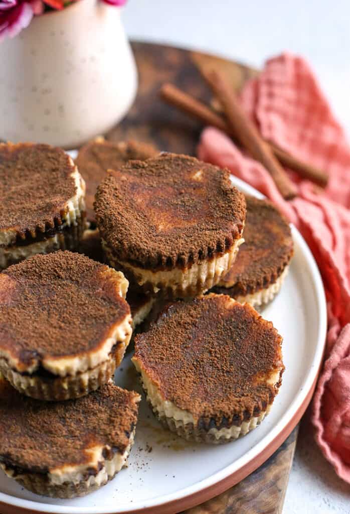 gluten free cinnamon roll cheesecakes on a plate