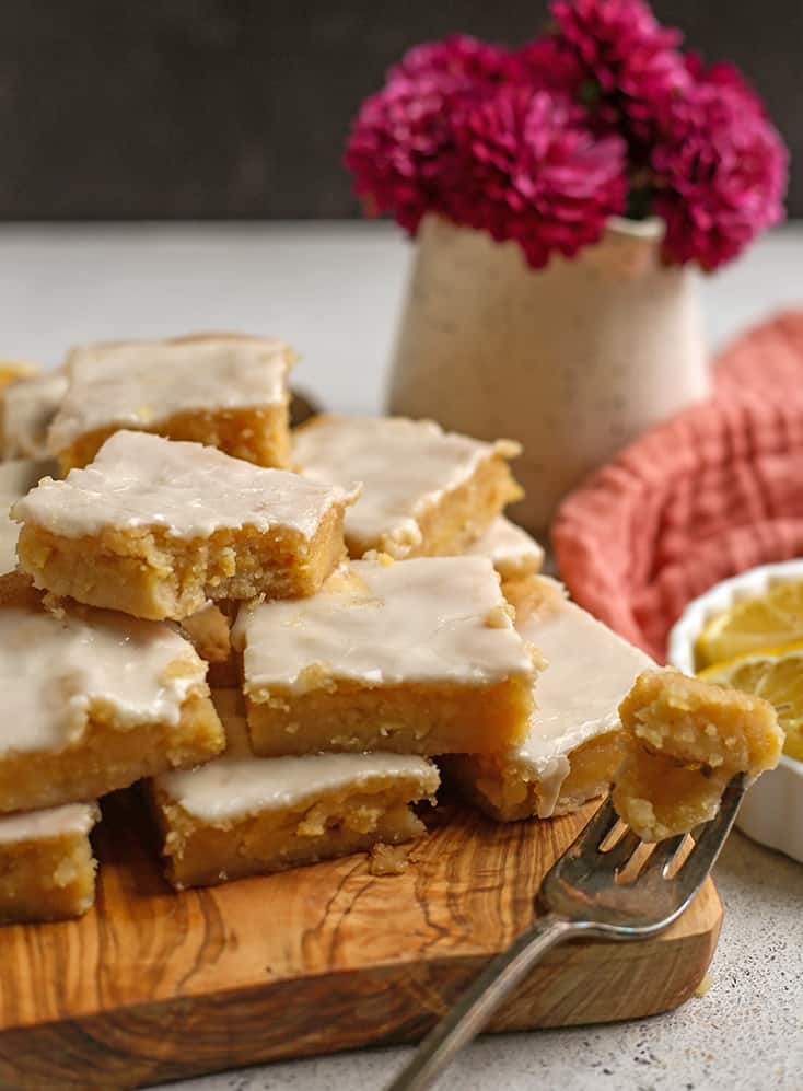 stack of grain free lemon pop tart bars on a cutting board 