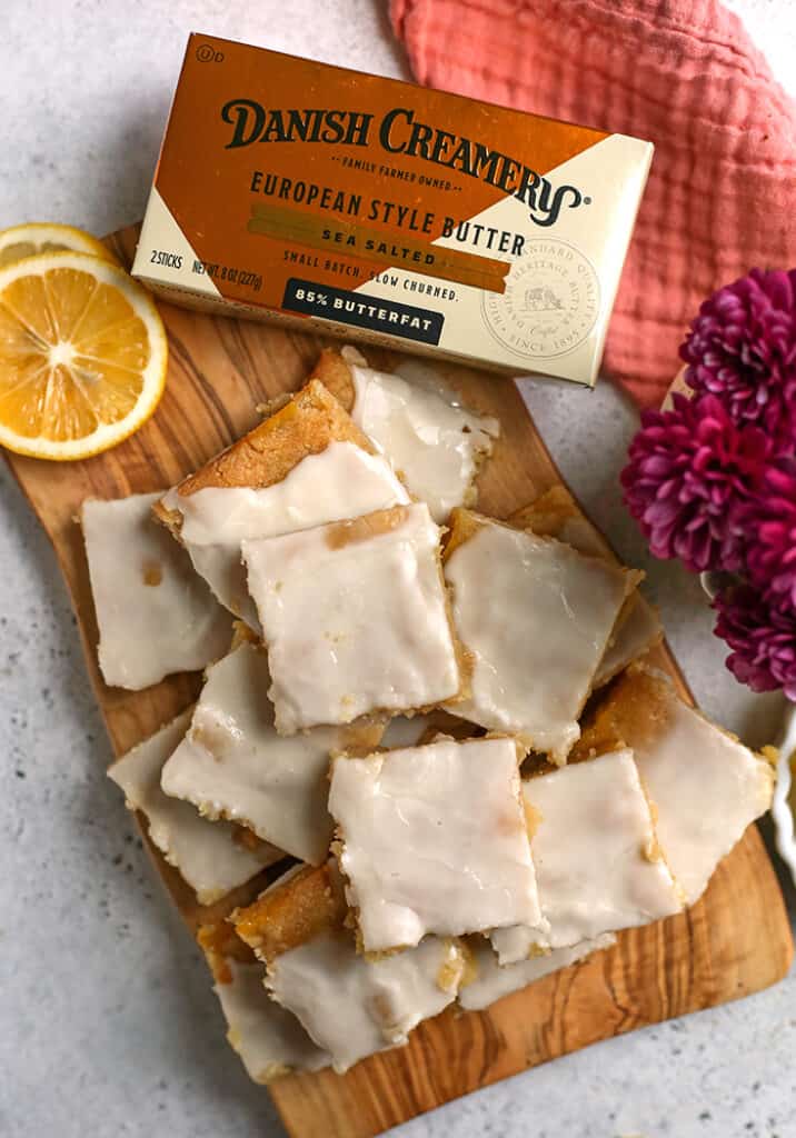 cutting board with pieces of lemon pop tart bars 