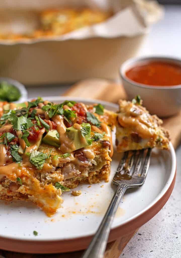 close up view of breakfast casserole with a bite taken out
